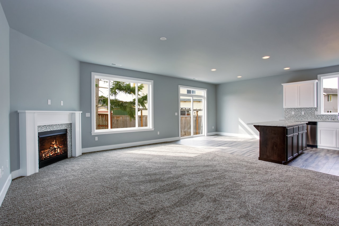 interior of house with gray carpet 