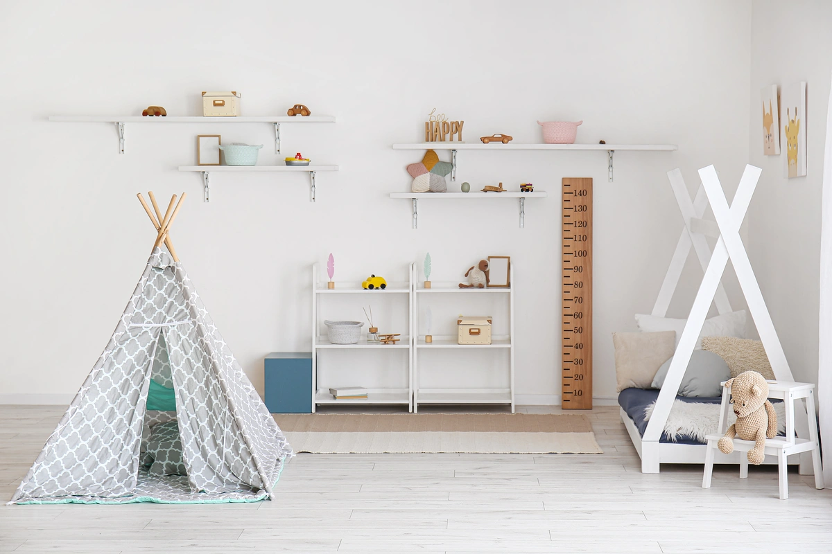 family creates niche wall shelving to store childrens toys